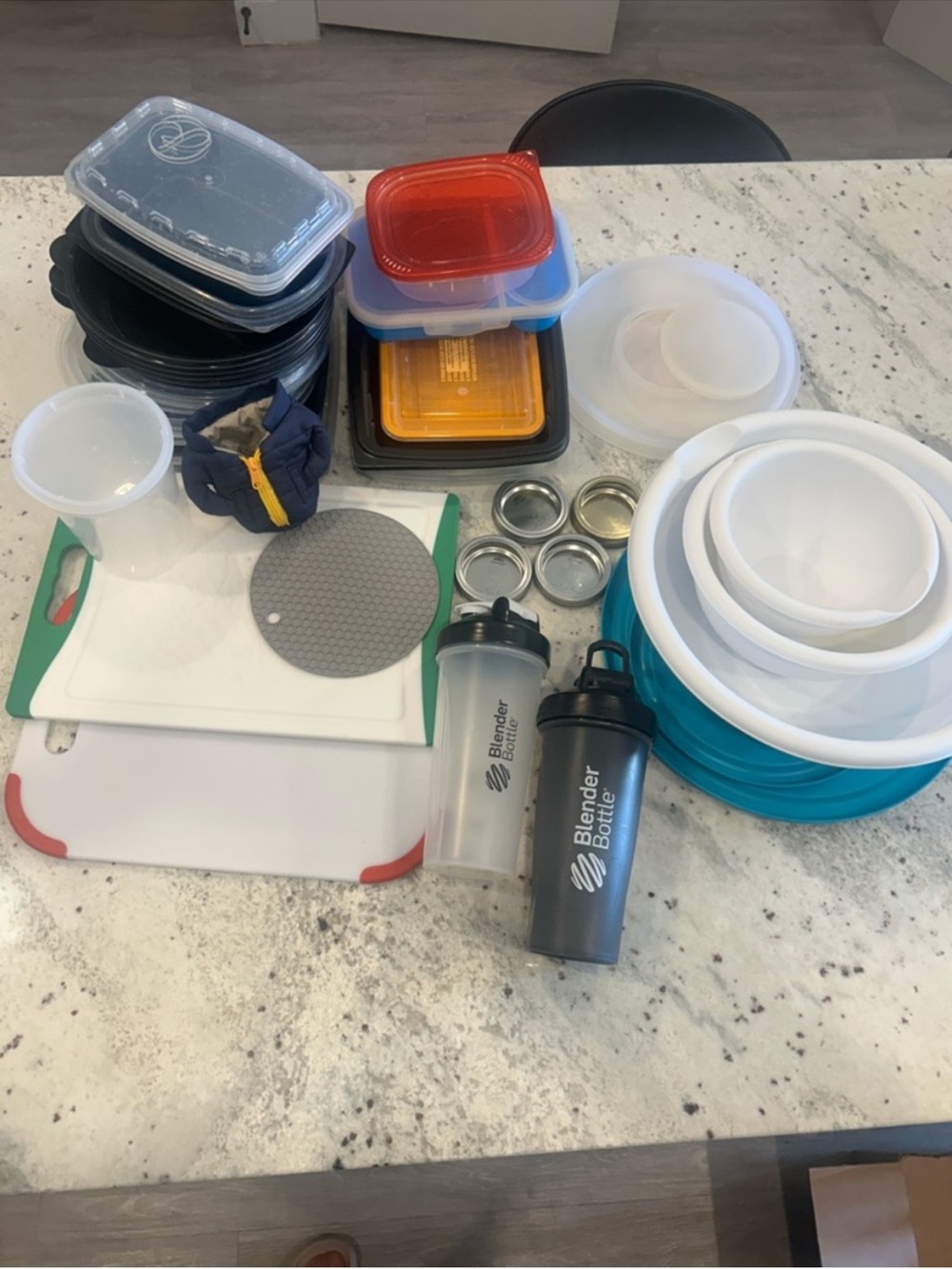 Mixing bowls with lids, Tupperware containers, Blender bottles, cutting boards